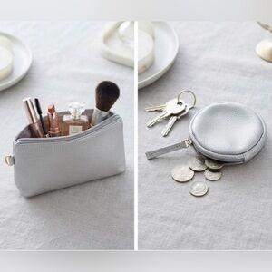 NWOT 2 small coin purses / makeup bags plastic silver